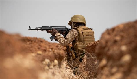 Suspected jihadists kill hundreds in Burkina Faso attack.